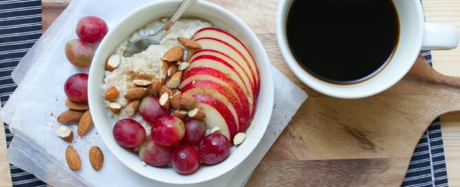 red fruit on white ceramic bowl